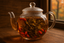 beautiful goji berry oolong tea unfurling in glass tea pot - close up - wood theme background with window in autumn 
