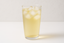 generate iced buckwheat tea in a glass of a pale light yellow